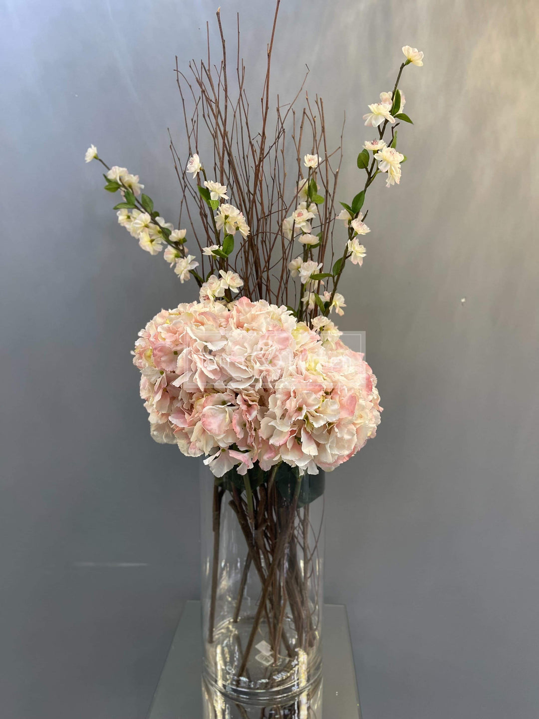 Pink Hydrangeas, Blossom and Willow in a tall glass